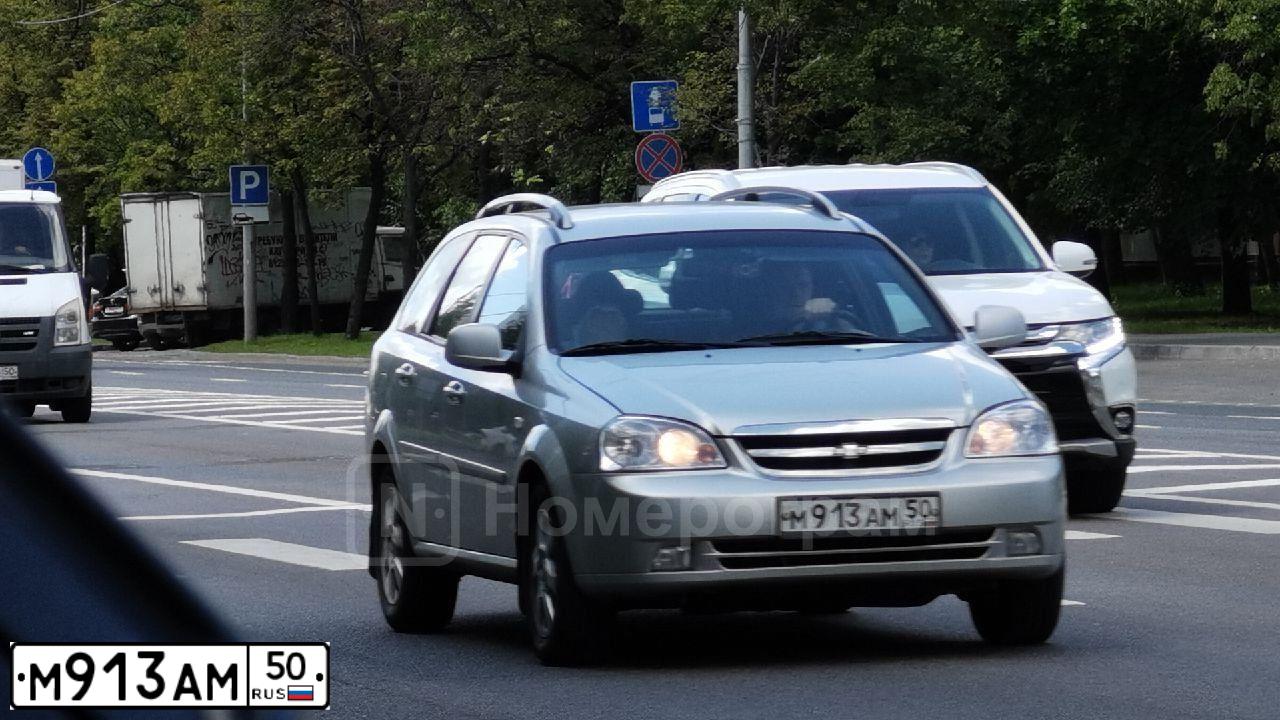 Фото автомобиля CHEVROLET LACETTI, 2012 — госномер Е396ХО197. Цвет: СЕРЫЙ