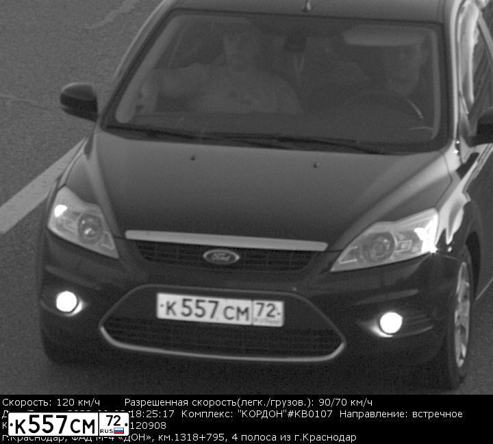Фото автомобиля FORD FOCUS, 2008 — госномер К557СМ72. Цвет: ЧЕРНЫЙ