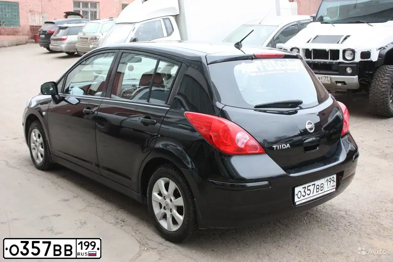 Фото автомобиля NISSAN TIIDA, 2007 — госномер Р455КР761. Цвет: ЧЕРНЫЙ