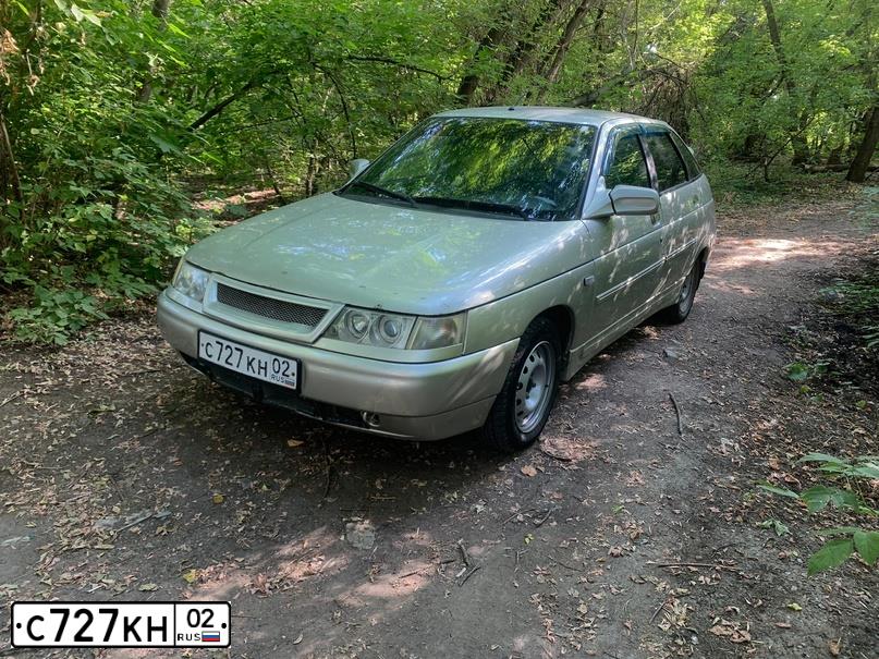 Фото автомобиля LADA 2112, 2006 — госномер К153МЕ702. Цвет: СЕРЕБРИСТО-БЕЖЕВЫЙ