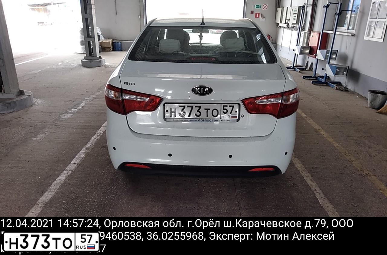 Фото автомобиля KIA RIO, 2012 — госномер Н373ТО57. Цвет: БЕЛЫЙ