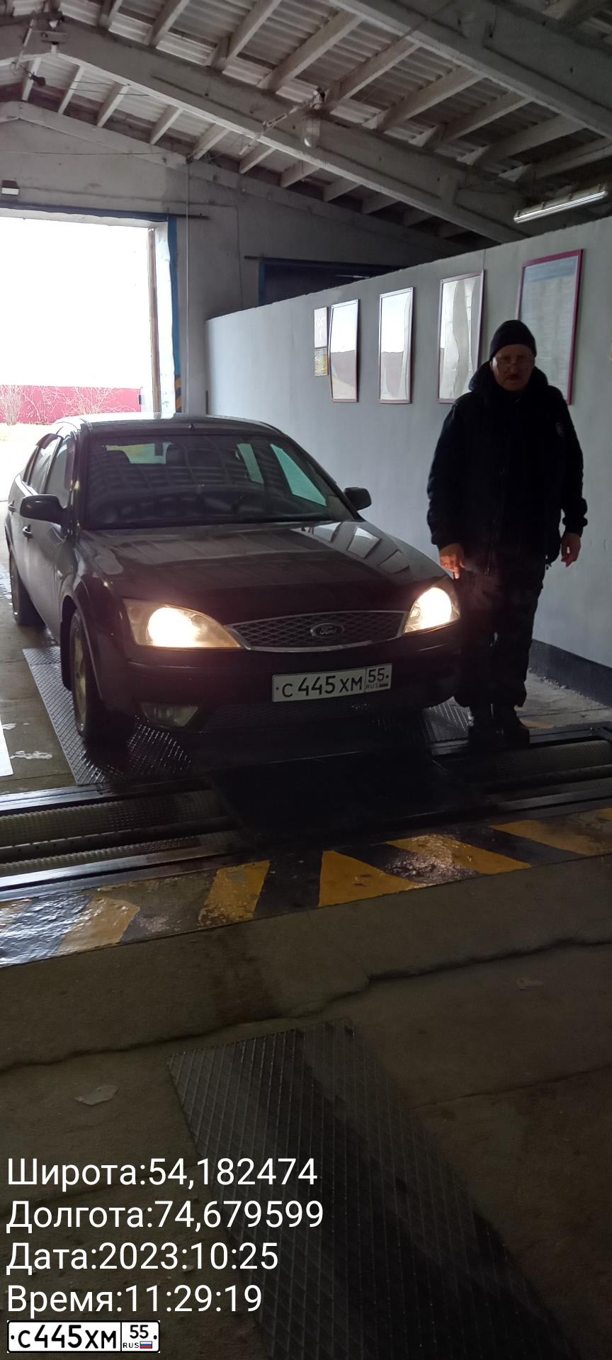 Фото автомобиля MITSUBISHI LANCER, 2008 — госномер Т008ОР199. Цвет: ЧЕРНЫЙ