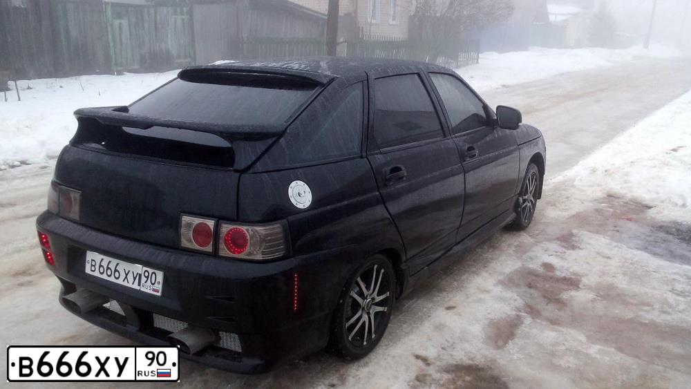 Фото автомобиля LADA 2112, 2003 — госномер В666ХУ90. Цвет: ОРАНЖЕВЫЙ