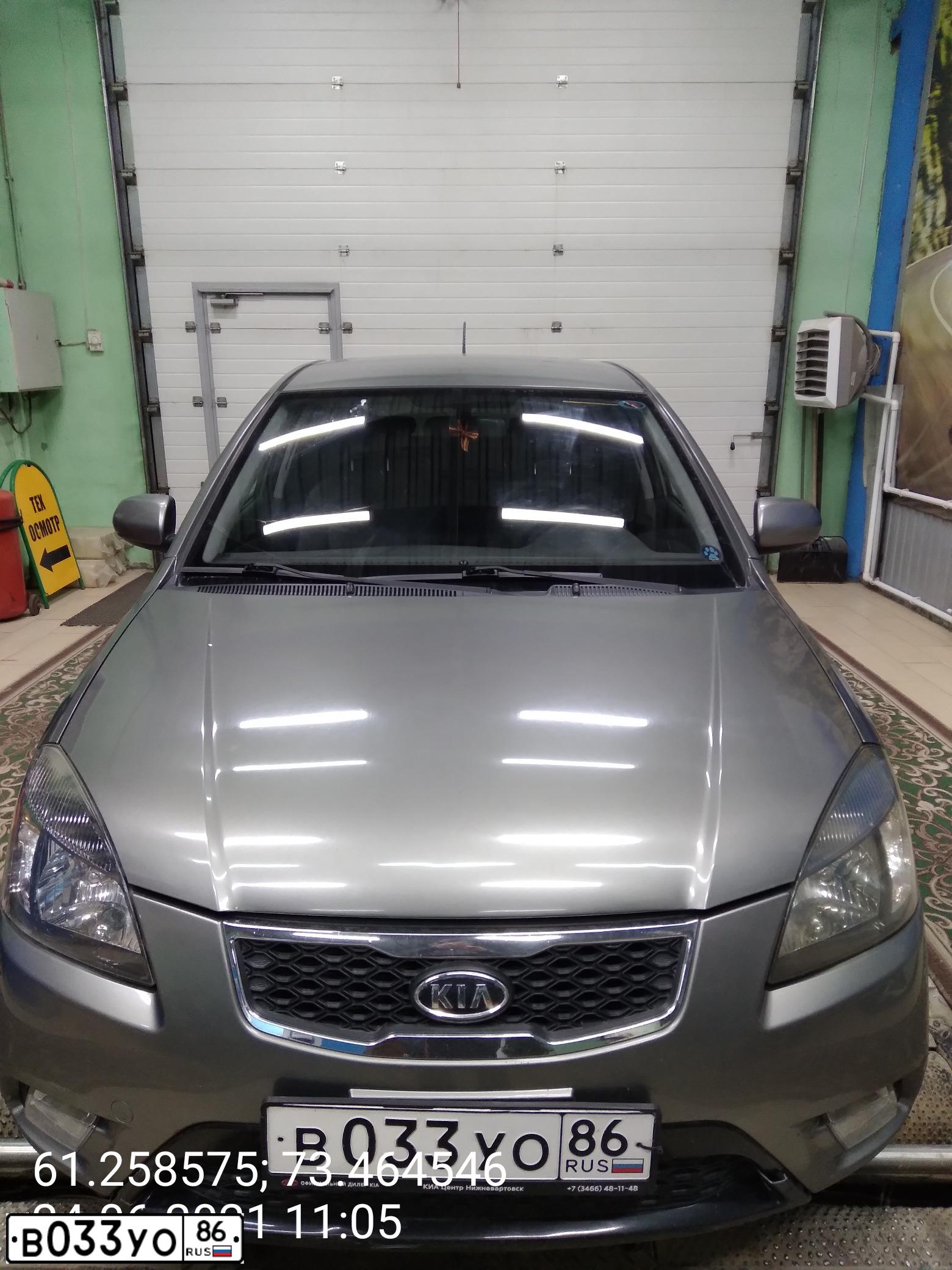 Фото автомобиля KIA RIO, 2010 — госномер В033УО86. Цвет: ПЕРЛАМ.СЕРЕБРИСТЫЙ