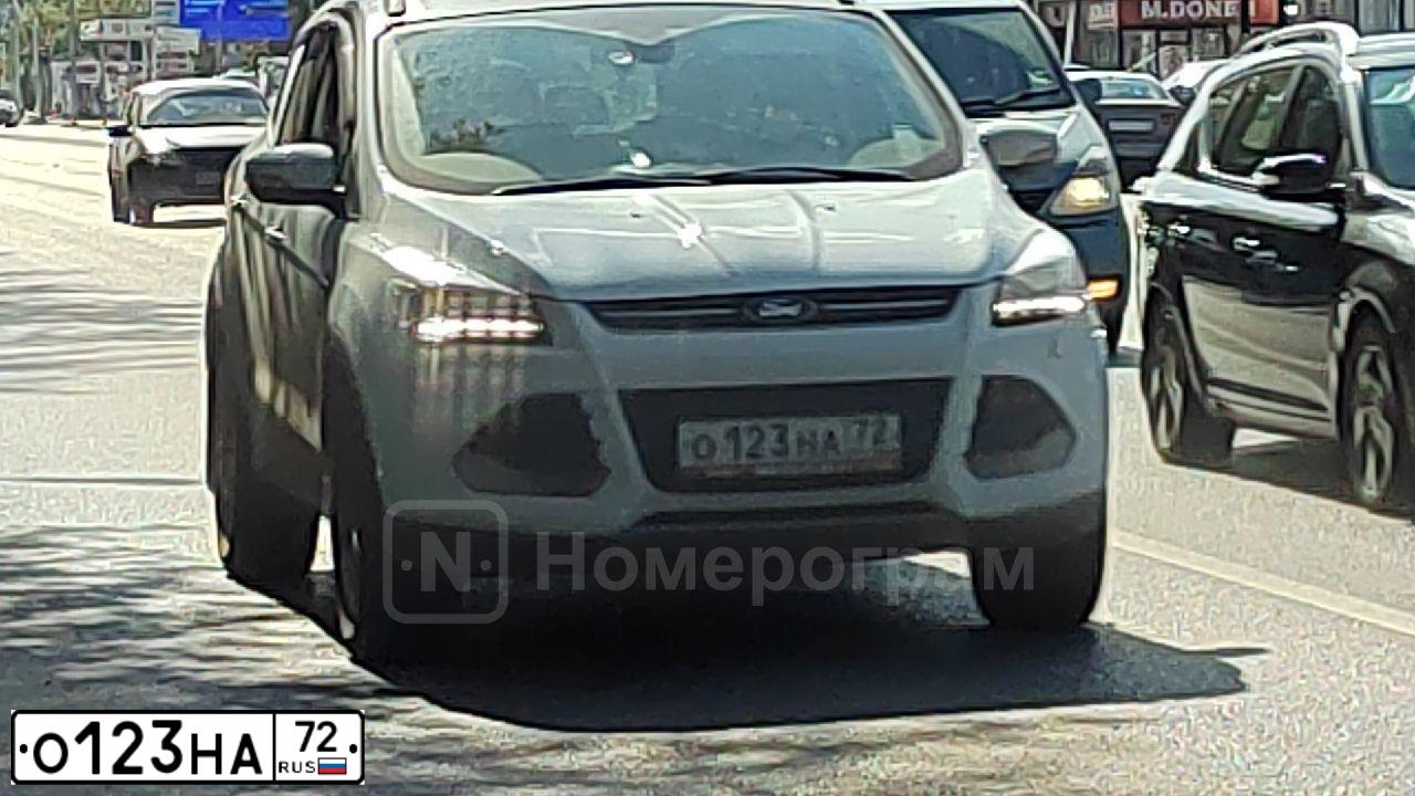 Фото автомобиля MITSUBISHI LANCER, 2013 — госномер О123НА72. Цвет: Серебристый