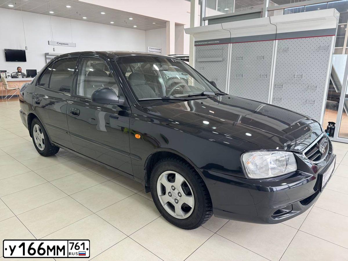 Фото автомобиля TAGAZ ACCENT, 2009 — госномер У166ММ761. Цвет: ЧЕРНЫЙ