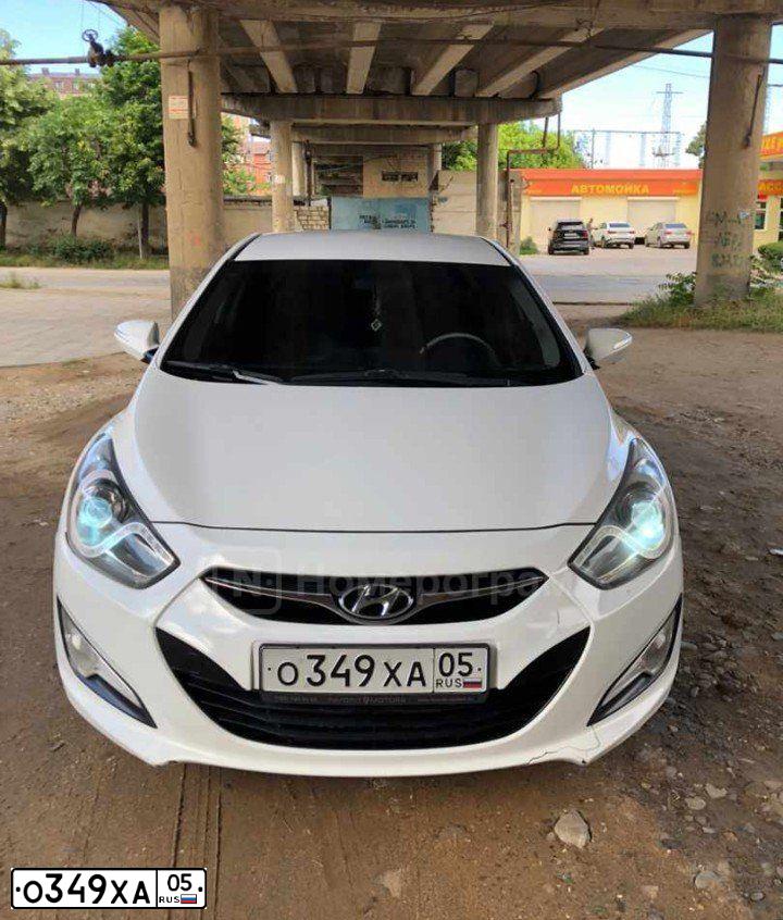 Фото автомобиля HYUNDAI I40, 2013 — госномер О349ХА05. Цвет: Белый