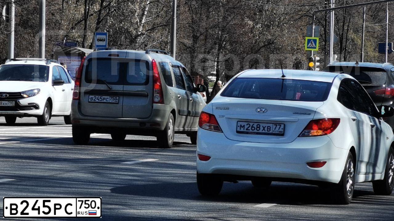 Фото автомобиля LADA LARGUS, 2013 — госномер В245РС750. Цвет: СЕРЫЙ ТЕМНЫЙ