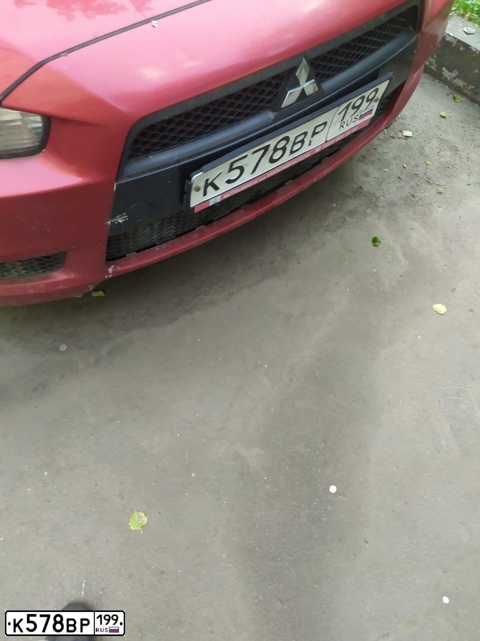 Фото автомобиля MITSUBISHI LANCER, 2008 — госномер К578ВР199. Цвет: КРАСНЫЙ