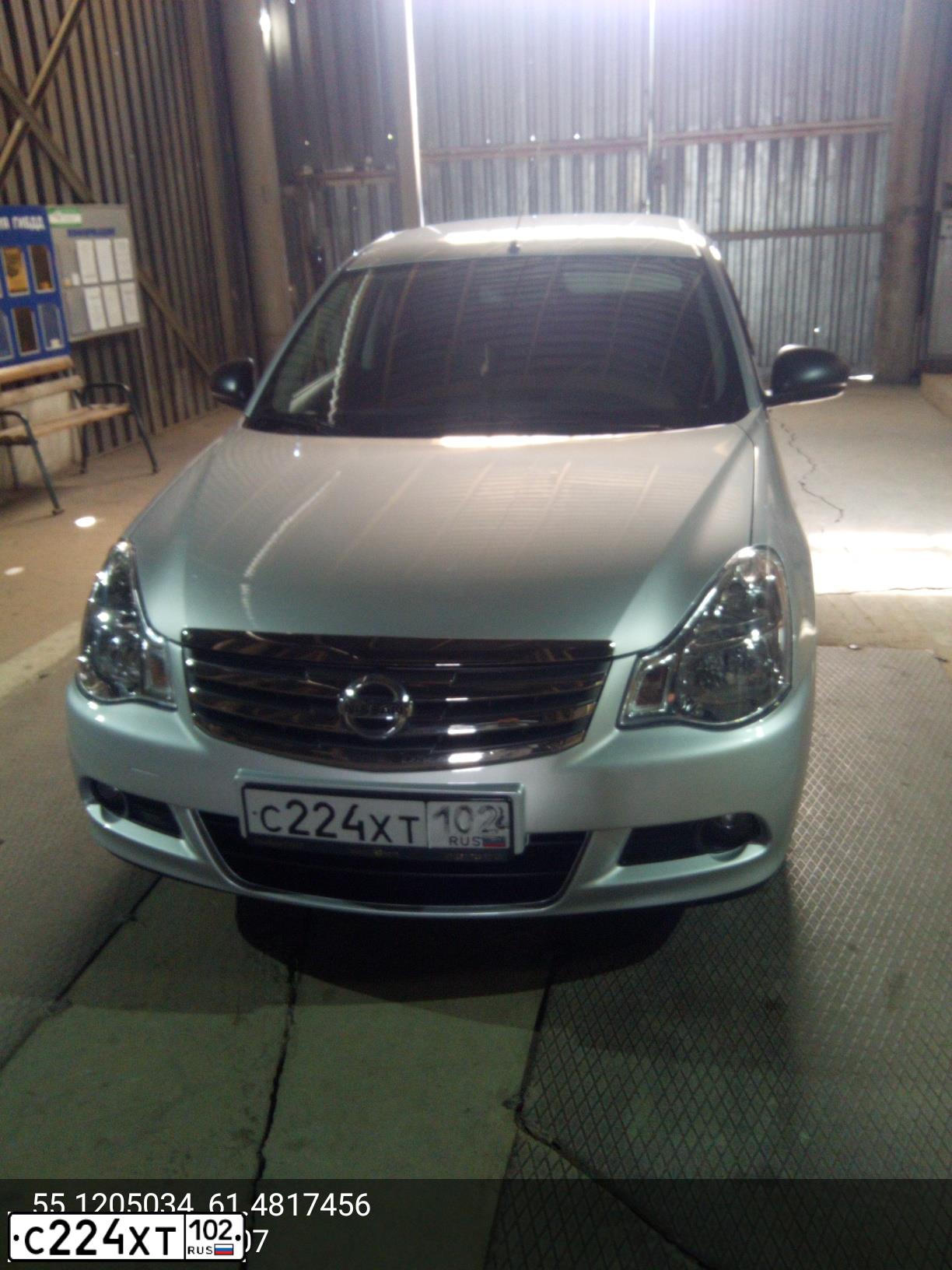 Фото автомобиля NISSAN ALMERA /AVTOVAZ/, 2016 — госномер Х734ВЕ774. Цвет: Серебристый