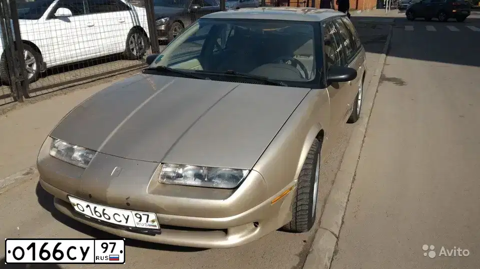 Фото автомобиля SATURN UNSPECIFIED, 1993 — госномер О166СУ97. Цвет: ЗОЛОТИСТЫЙ