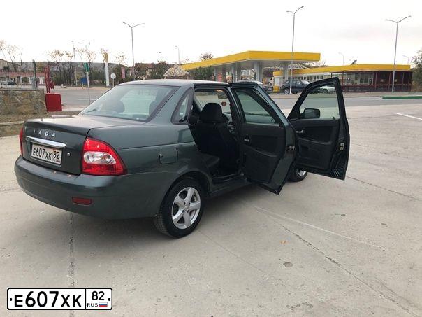 Фото автомобиля ЛАДА 217030 LADA PRIORA, 2011 — госномер Р476АК82. Цвет: СЕРЫЙ
