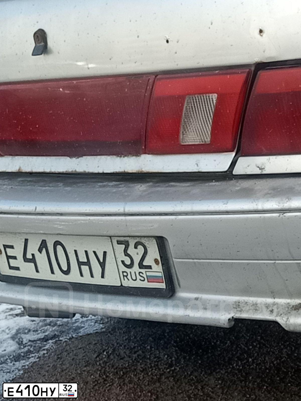 Фото автомобиля LADA 2115 SAMARA, 2002 — госномер Е410НУ32. Цвет: СЕРЕБРИСТЫЙ