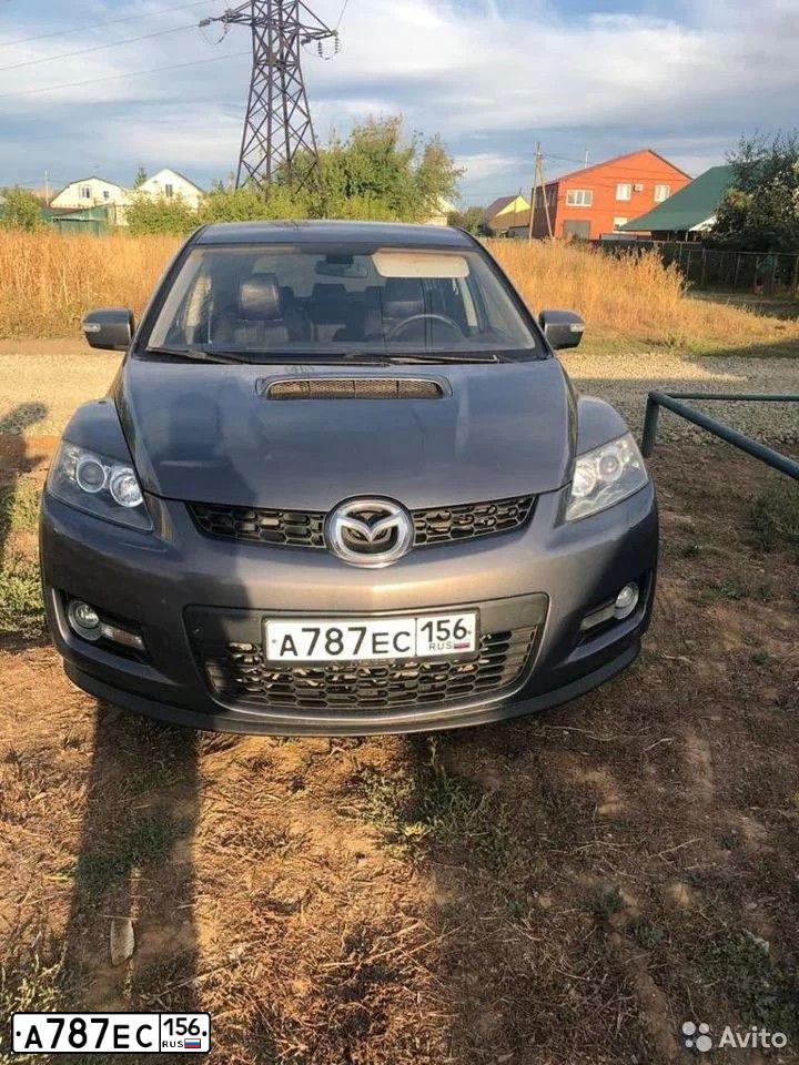 Фото автомобиля MAZDA CX-7, 2007 — госномер О555НН56. Цвет: СЕРЫЙ