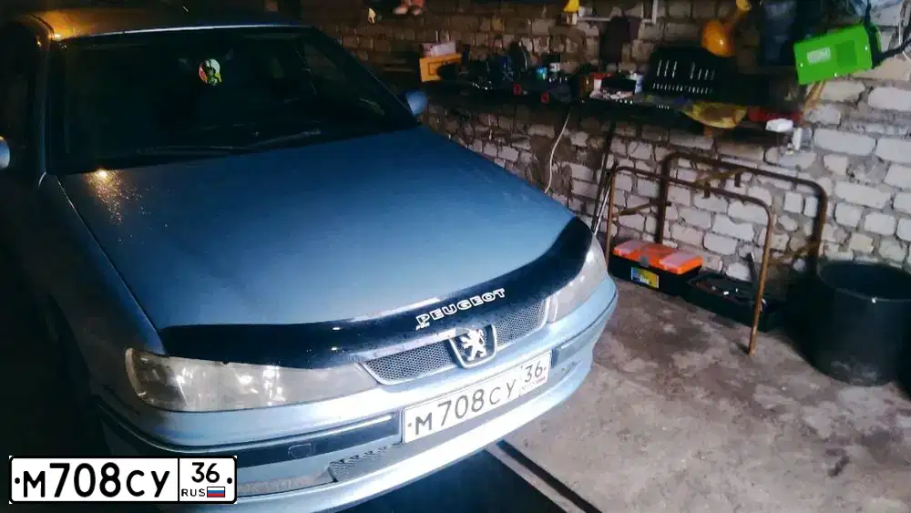 Фото автомобиля PEUGEOT 406, 2002 — госномер Н404КВ136. Цвет: СВЕТЛО-ГОЛУБОЙ
