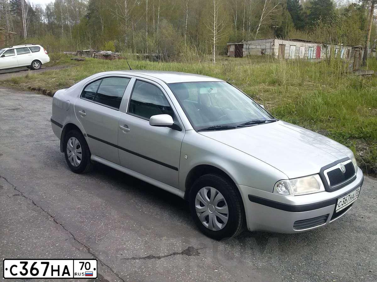 Фото автомобиля SKODA OCTAVIA, 2007 — госномер С339МС70. Цвет: СЕРЕБРИСТЫЙ