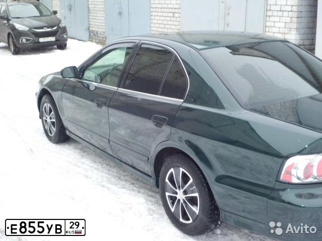 Фото автомобиля MITSUBISHI GALANT, 2000 — госномер О716МЕ29. Цвет: ЗЕЛЕНЫЙ