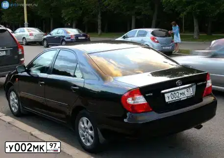 Фото автомобиля TOYOTA CAMRY, 2003 — госномер Е058КС03. Цвет: ЧЕРНЫЙ