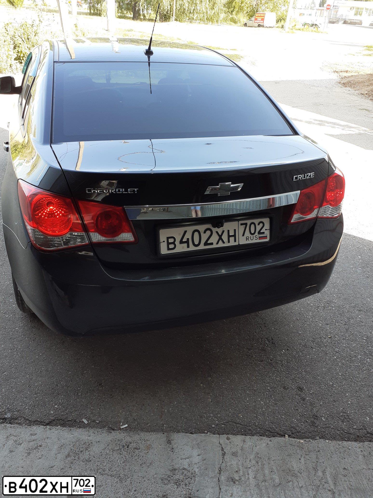 Фото автомобиля CHEVROLET CRUZE, 2010 — госномер В402ХН702. Цвет: ЧЕРНЫЙ
