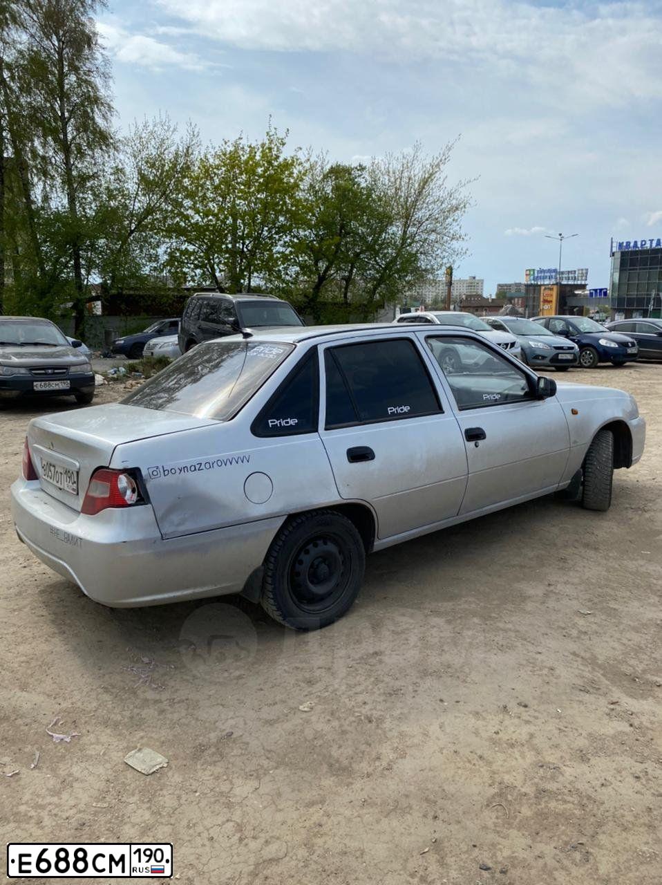 Фото автомобиля DAEWOO NEXIA, 2011 — госномер Е688СМ190. Цвет: ЧЕРНЫЙ БЛЕДНЫЙ