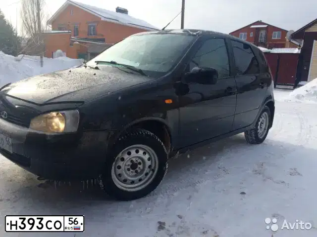 Фото автомобиля LADA 2112 LADA, 2006 — госномер Н393СО56. Цвет: черно-зеленый металлик
