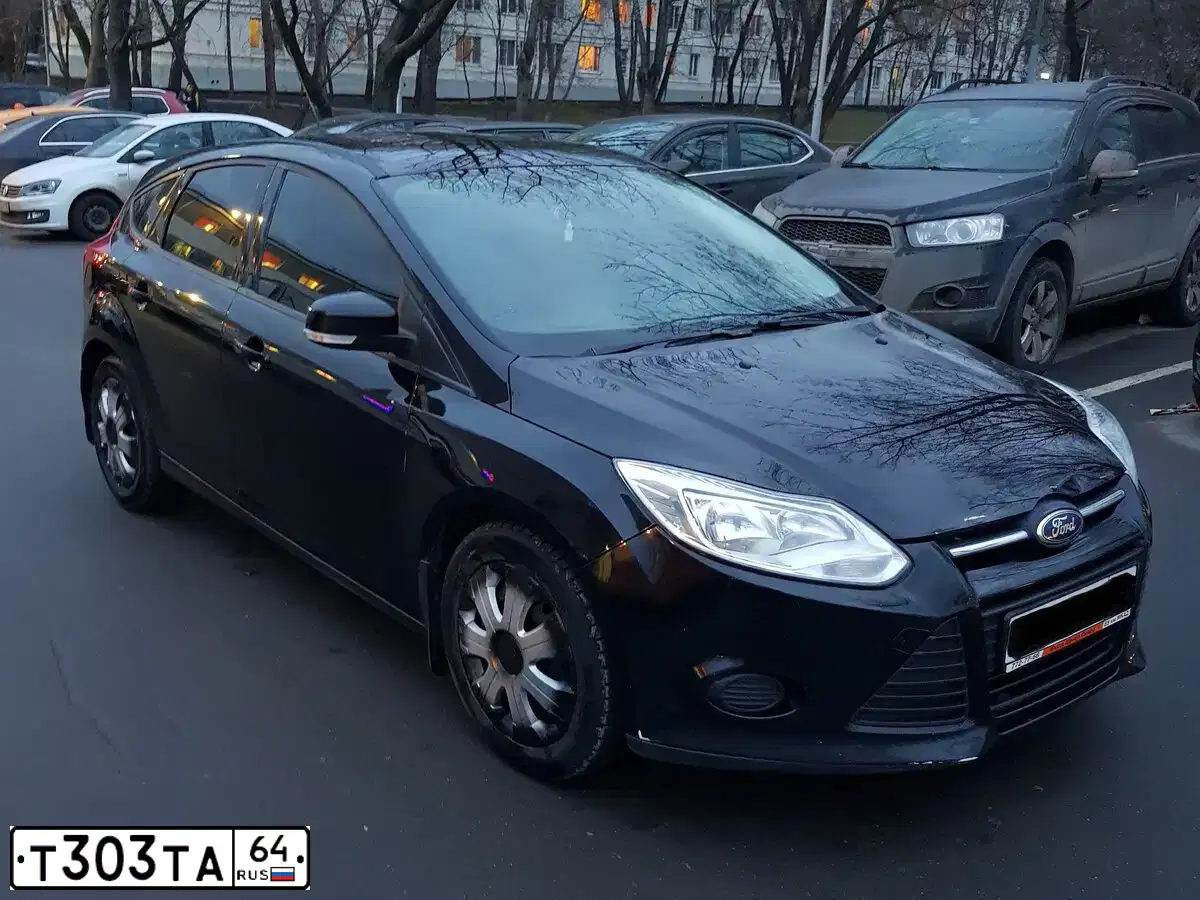 Фото автомобиля FORD FOCUS, 2013 — госномер Т303ТА64. Цвет: СЕРО ГОЛУБОЙ