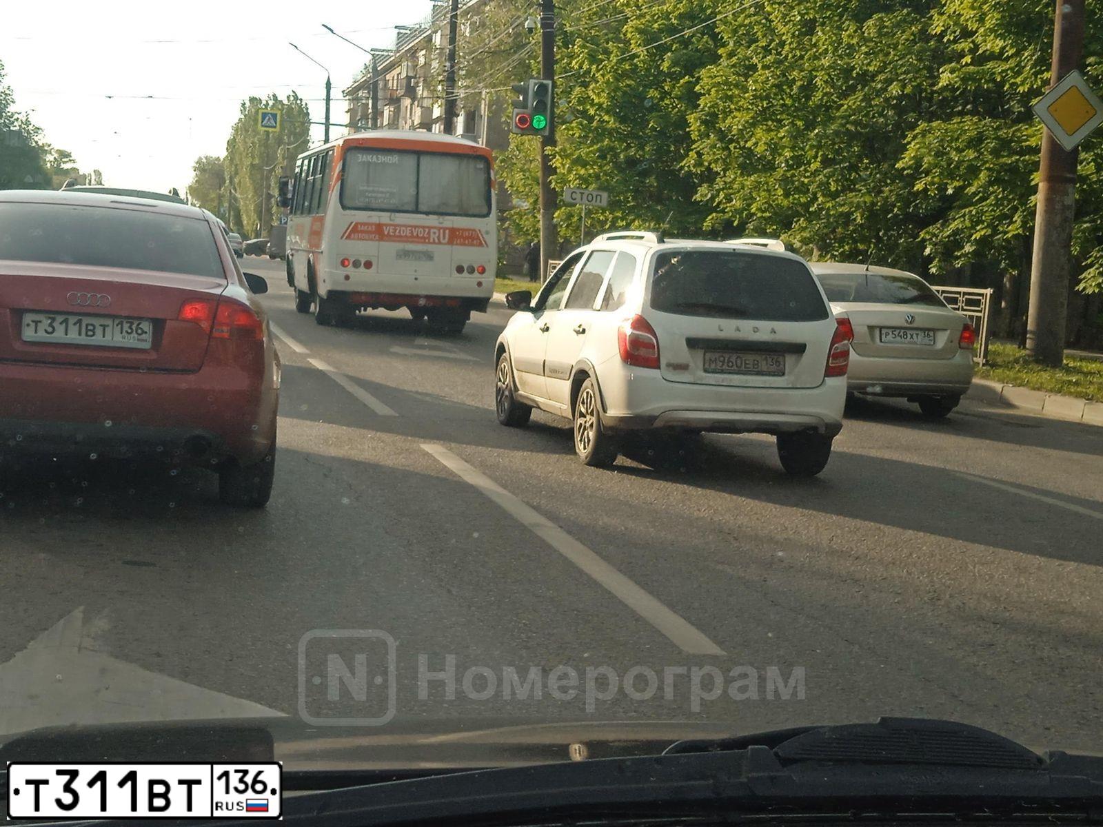 Фото автомобиля AUDI A4, 2005 — госномер Т311ВТ136. Цвет: ВИШНЕВЫЙ