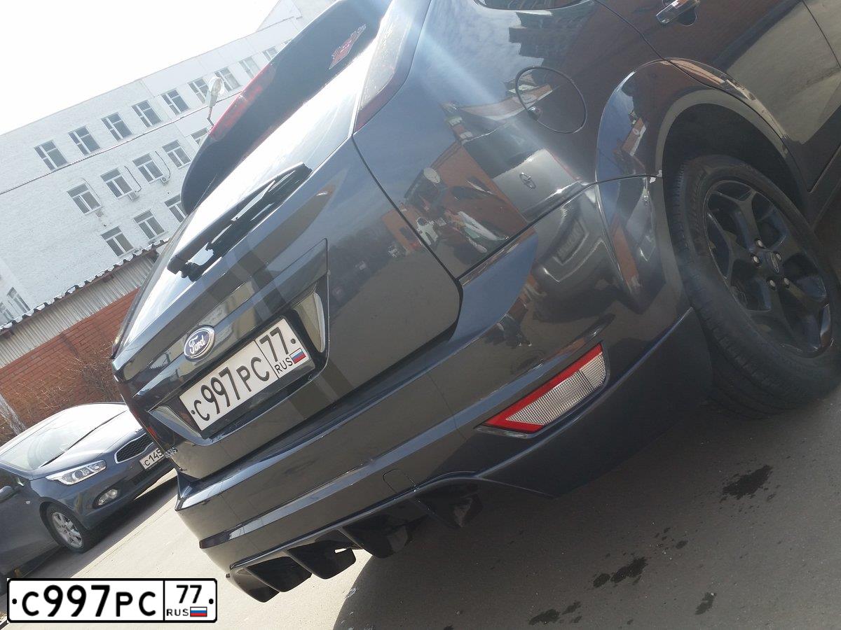 Фото автомобиля FORD FOCUS, 2010 — госномер Т240МХ190. Цвет: СЕРЫЙ ТЕМНЫЙ