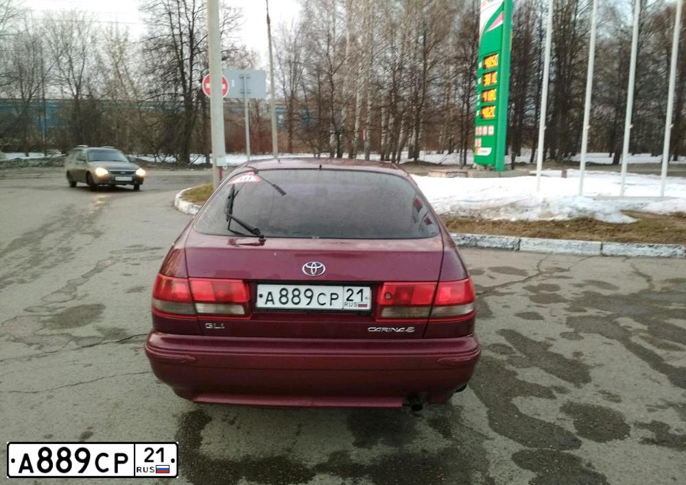 Фото автомобиля TOYOTA CARINA, 1994 — госномер К737ВТ21. Цвет: КРАСНЫЙ