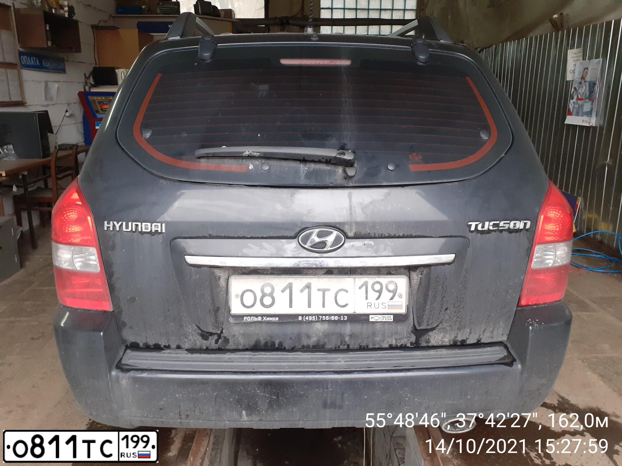 Фото автомобиля HYUNDAI TUCSON, 2008 — госномер О811ТС199. Цвет: ЧЕРНЫЙ