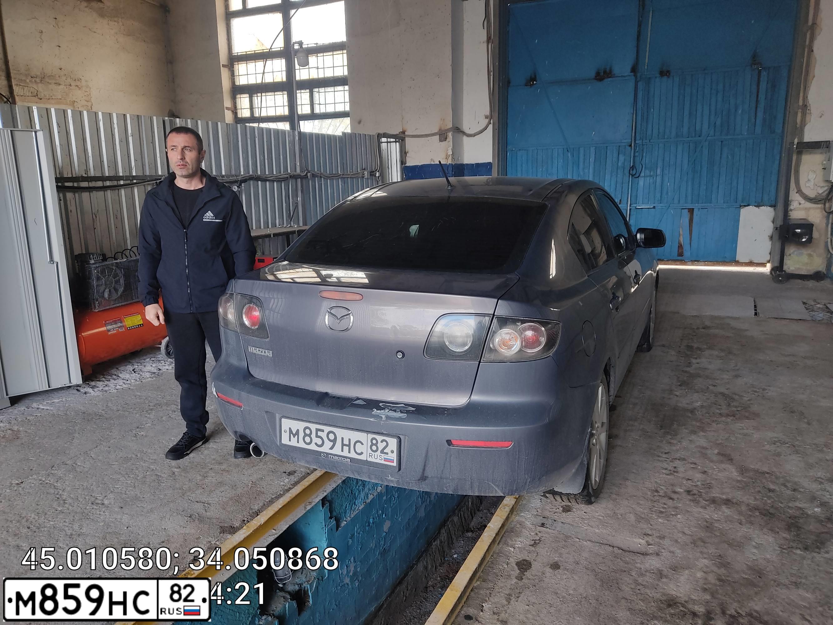 Фото автомобиля MAZDA 3, 2008 — госномер М859НС82. Цвет: Серый