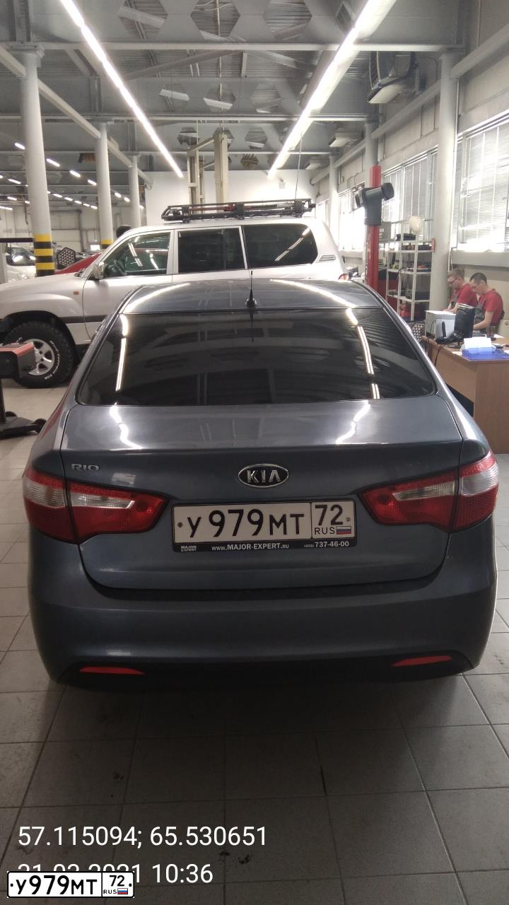 Фото автомобиля KIA RIO, 2012 — госномер У979МТ72. Цвет: голубой
