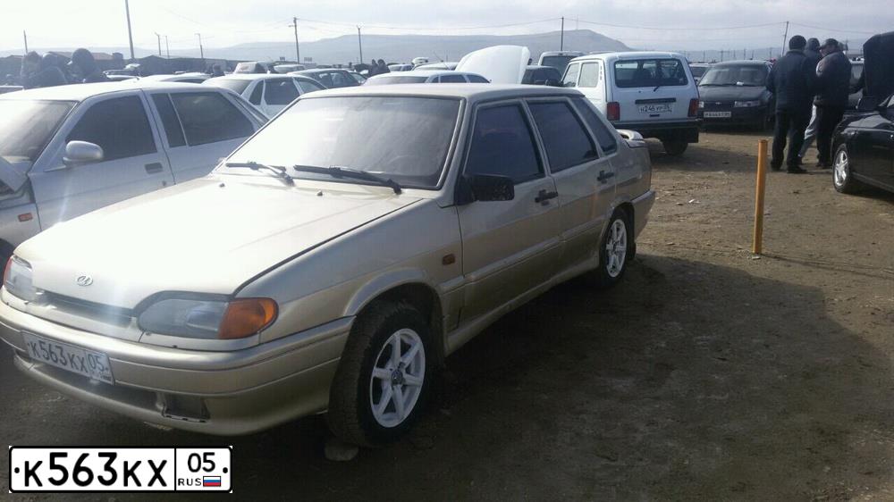 Фото автомобиля LADA 2115 SAMARA, 2001 — госномер К563КХ05. Цвет: Серебристо-золотой