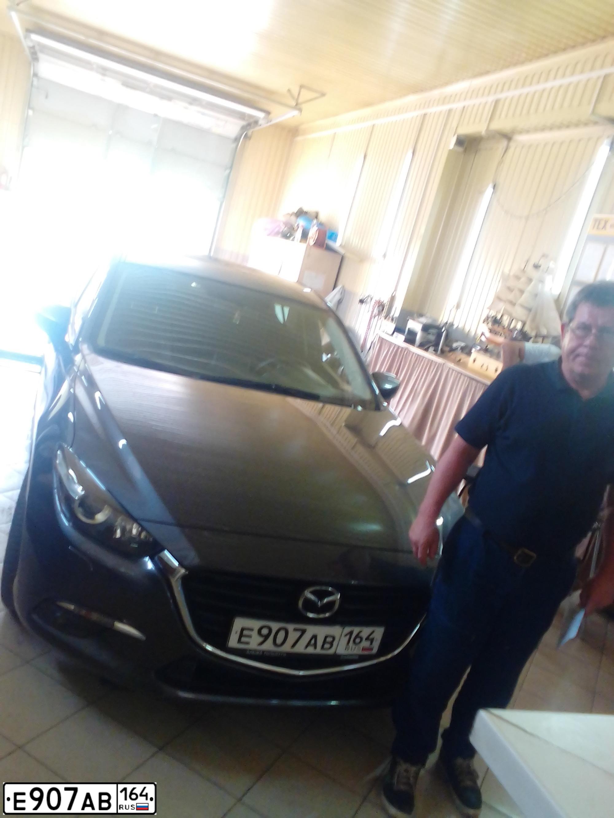 Фото автомобиля MAZDA 3, 2018 — госномер Е200ВВ164. Цвет: ТЕМНО-СЕРЫЙ
