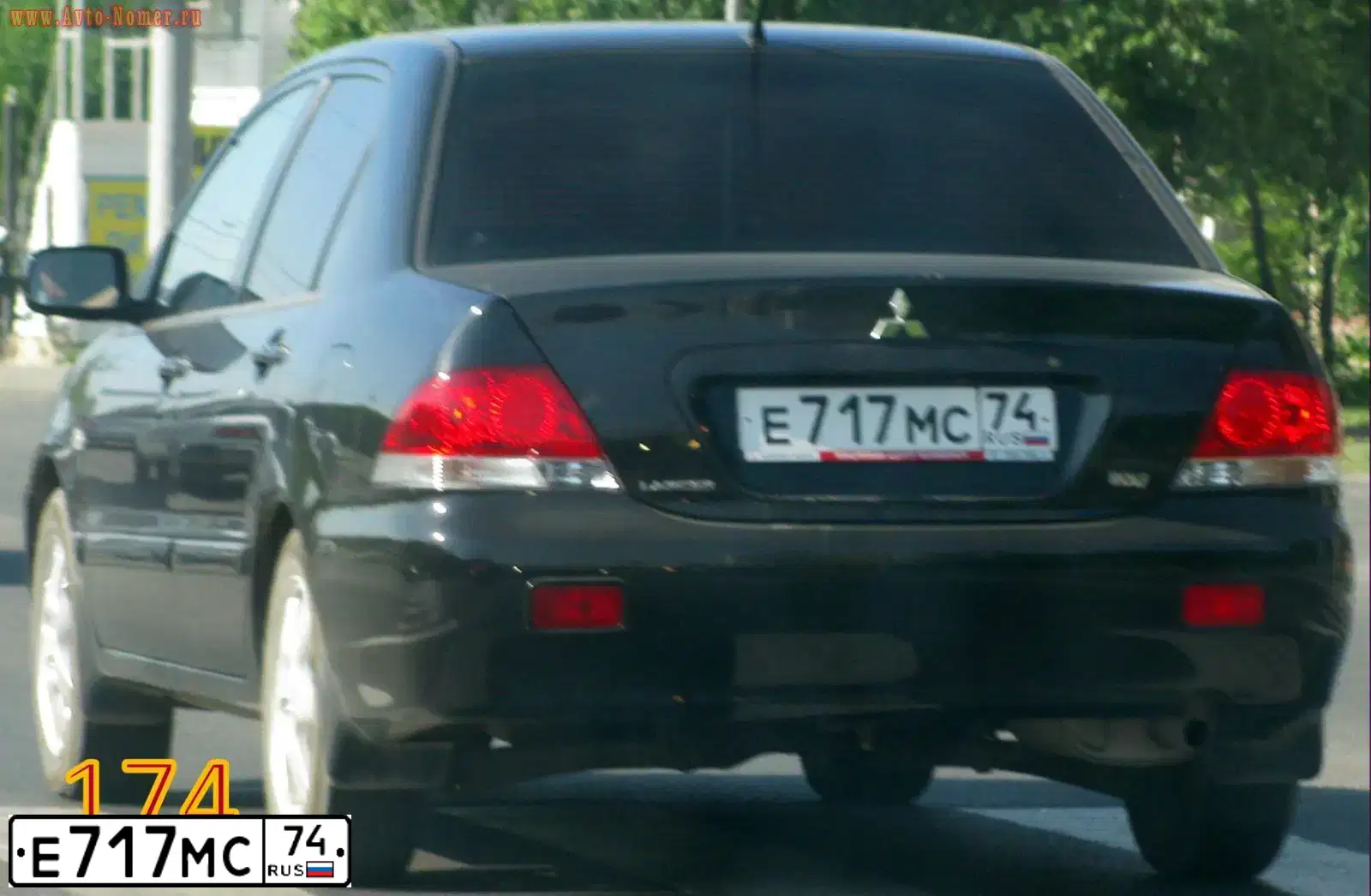 Фото автомобиля MITSUBISHI LANCER, 2007 — госномер Е717МС74. Цвет: ЧЕРНЫЙ