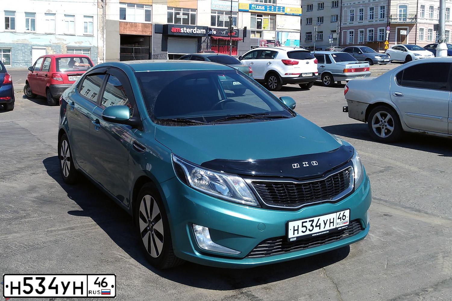 Фото автомобиля KIA RIO, 2011 — госномер У599РР190. Цвет: СВЕТЛО ЗЕЛЕНЫЙ