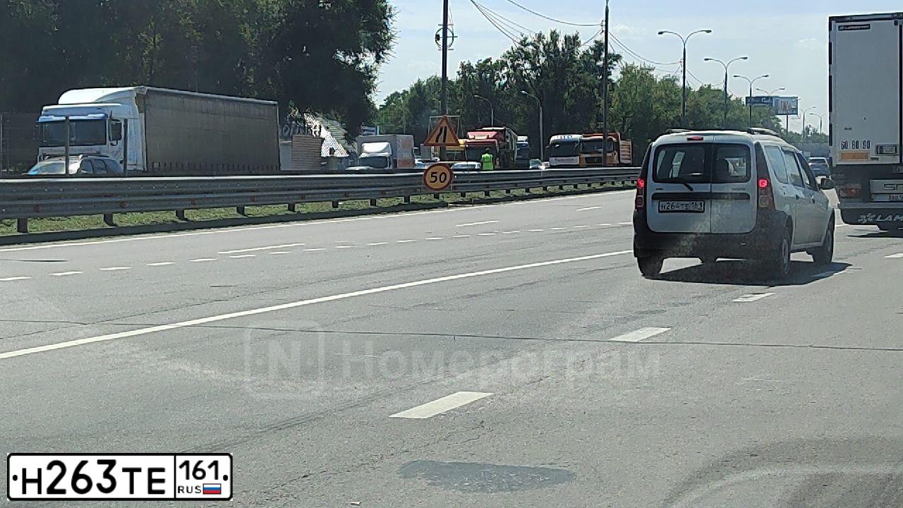 Фото автомобиля HONDA CIVIC, 2011 — госномер О050КО761. Цвет: СИНИЙ ТЕМНЫЙ