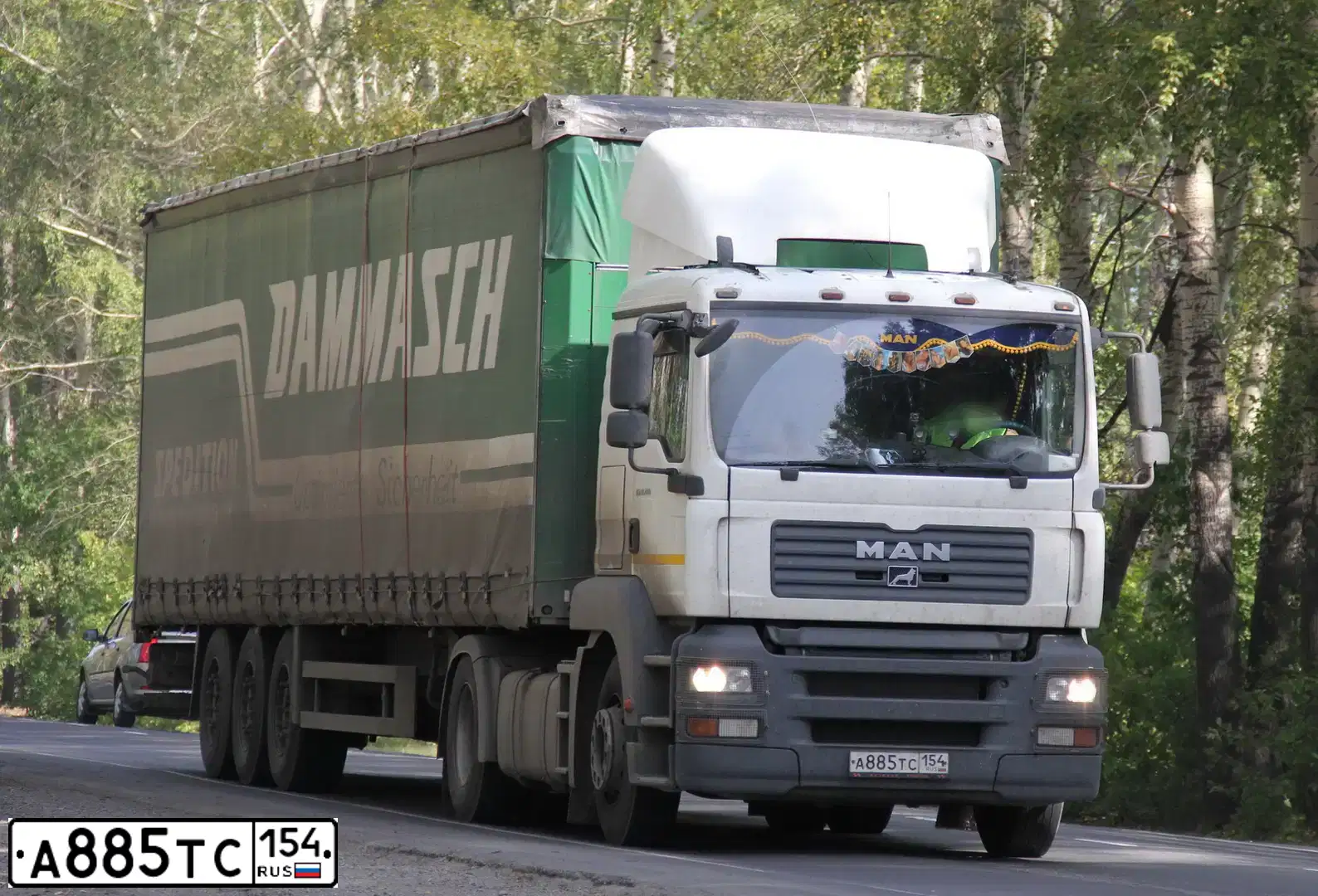 Фото автомобиля MAN TGA 18.480 4X2 BLS, 2008 — госномер О187ВУ75. Цвет: Белый