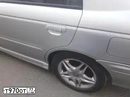 Фото автомобиля DAEWOO NEXIA, 1996 — госномер Т145МВ97. Цвет: ЗЕЛЕНЫЙ