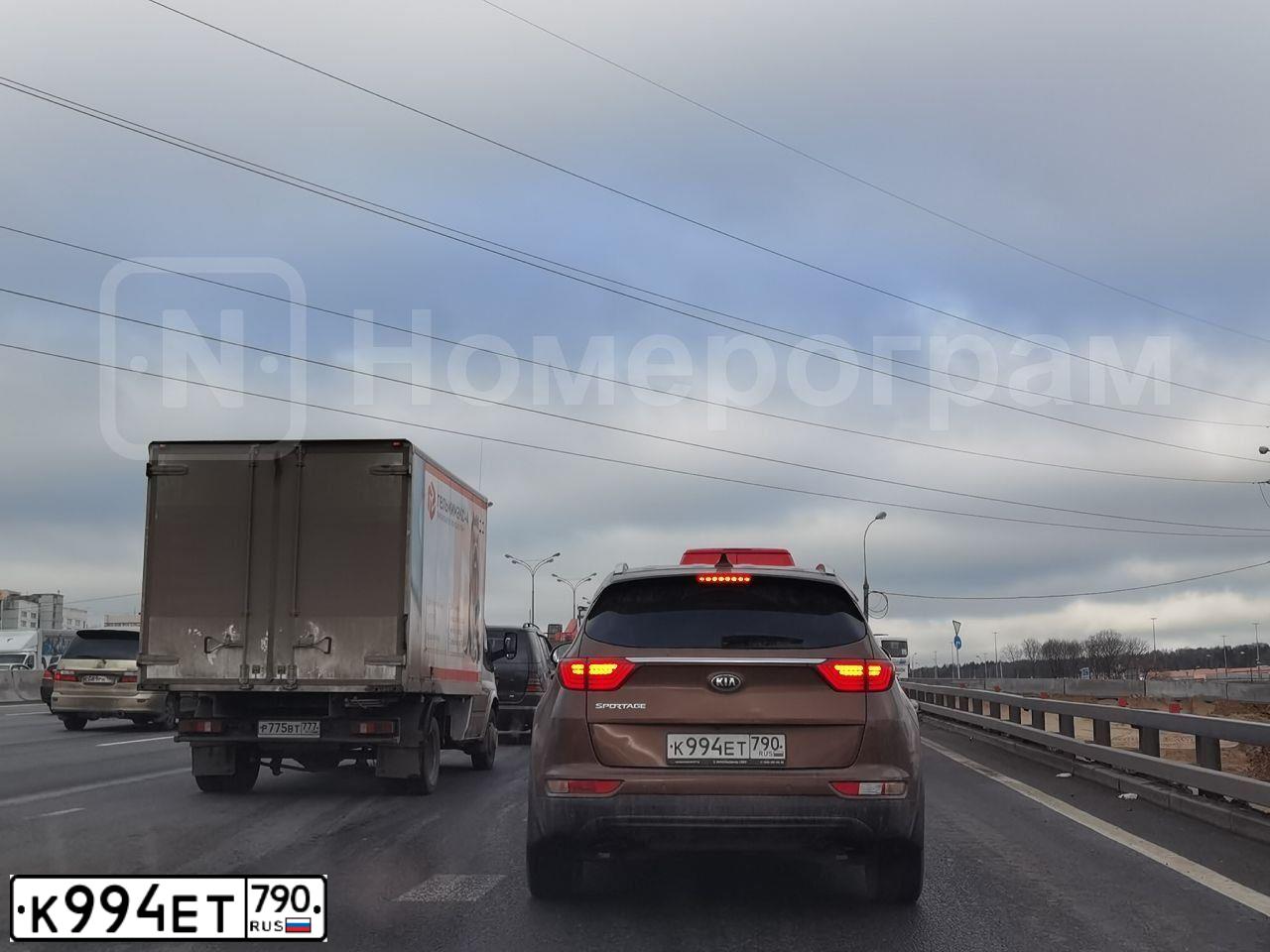 Фото автомобиля KIA SPORTAGE, 2016 — госномер К994ЕТ790. Цвет: Коричневый