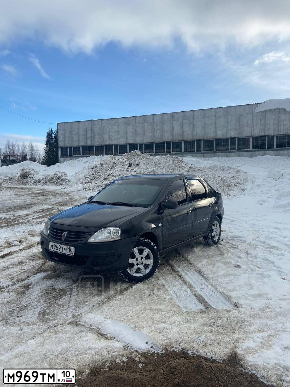 Фото автомобиля RENAULT LOGAN, 2011 — госномер М969ТМ10. Цвет: ЧЕРНЫЙ