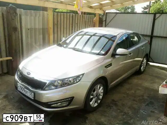 Фото автомобиля KIA OPTIMA, 2012 — госномер Р169КУ774. Цвет: СЕРО-БРОНЗОВЫЙ