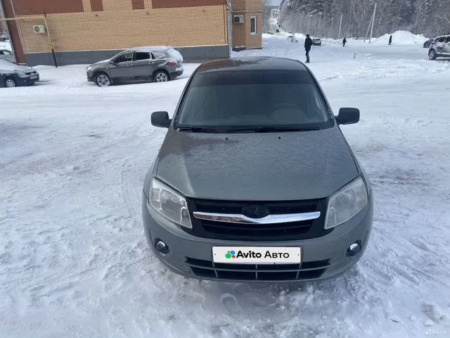 Фото автомобиля LADA 2190 GRANTA, 2012 — госномер М889НА702. Цвет: Темно-серый металлик