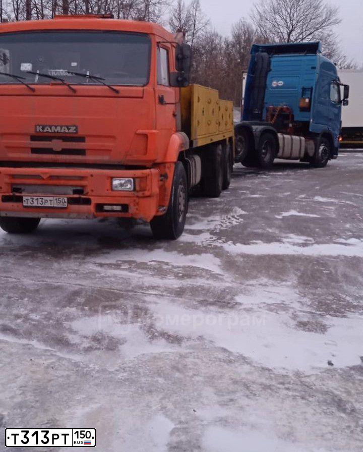 Фото автомобиля KAMAZ 6520 /6X4/, 2008 — госномер Т313РТ150. Цвет: Оранжевый
