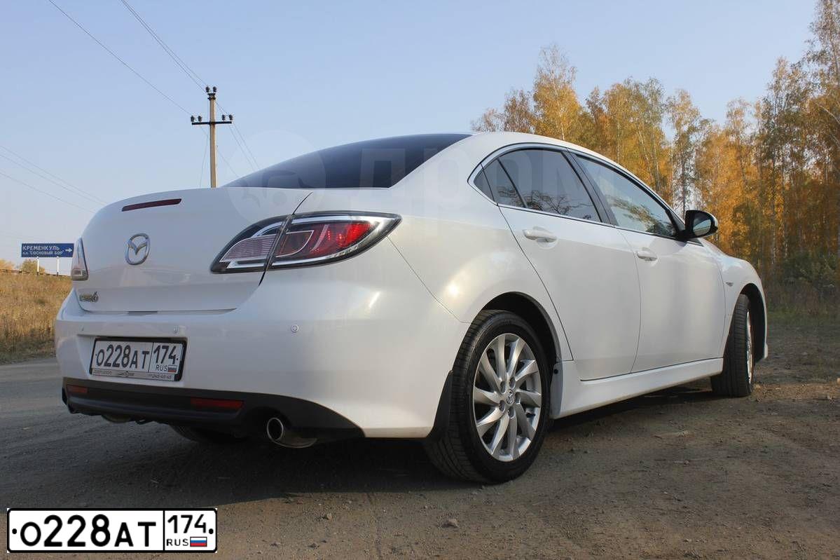 Фото автомобиля MAZDA 6, 2010 — госномер О228АТ174. Цвет: БЕЛЫЙ