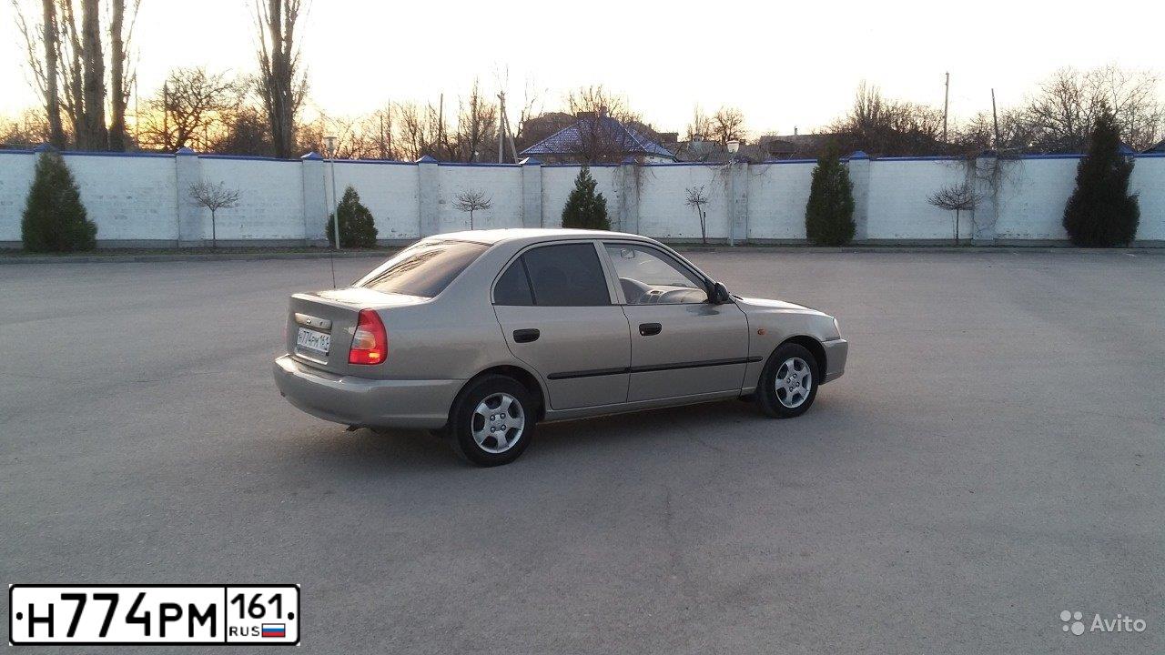 Фото автомобиля TAGAZ ACCENT, 2008 — госномер Е098ТТ161. Цвет: СВЕТЛО-БЕЖЕВЫЙ