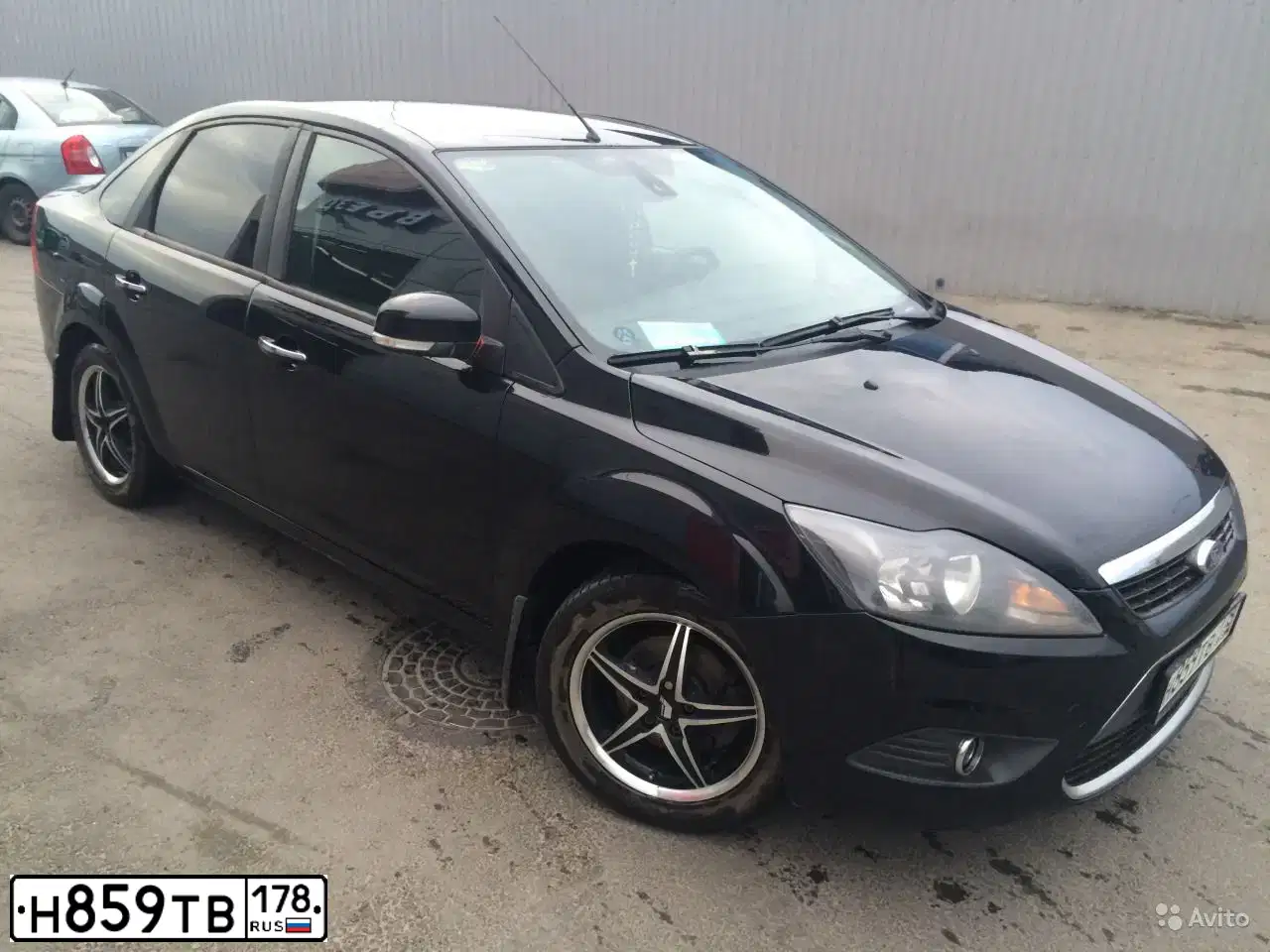 Фото автомобиля FORD FOCUS, 2010 — госномер Н859ТВ178. Цвет: ЧЕРНЫЙ