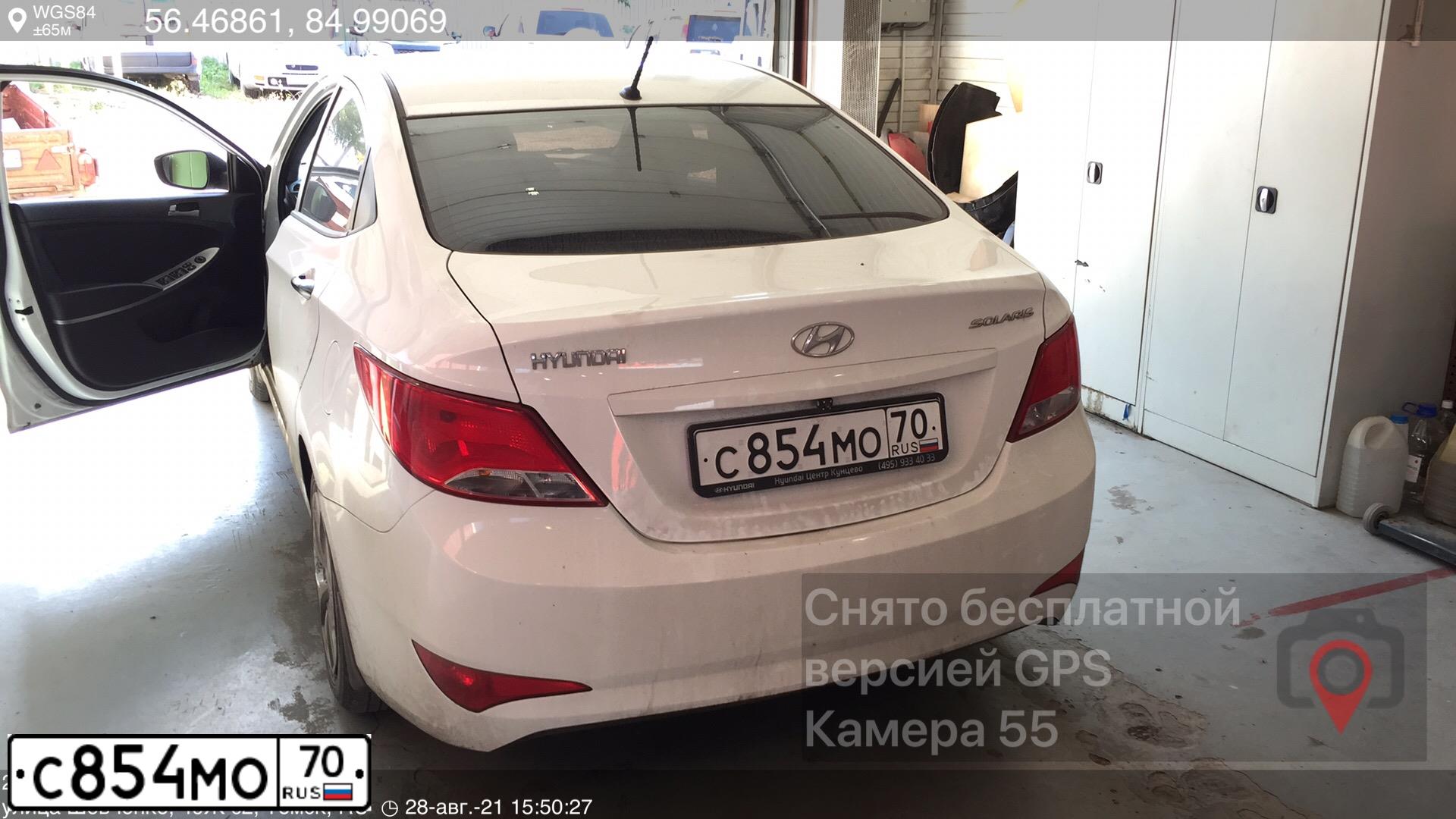 Фото автомобиля HYUNDAI SOLARIS, 2015 — госномер С854МО70. Цвет: Белый