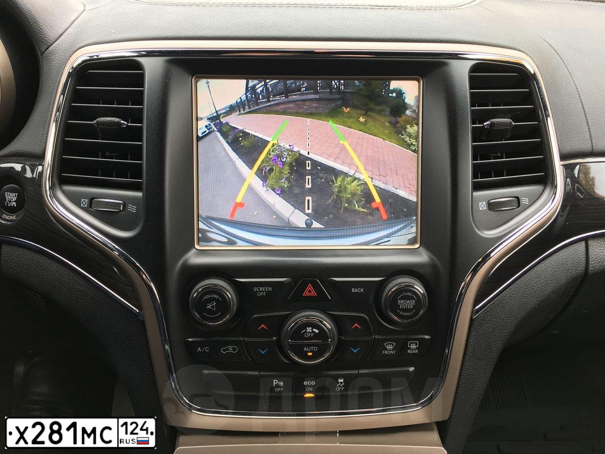 Фото автомобиля JEEP GRAND CHEROKEE, 2014 — госномер У288ТО790. Цвет: Серый