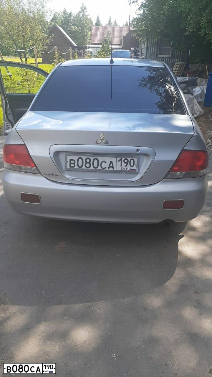 Фото автомобиля MITSUBISHI LANCER, 2004 — госномер О290ОВ67. Цвет: Серебристый